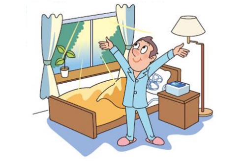 元気よく目覚める男性のイラスト